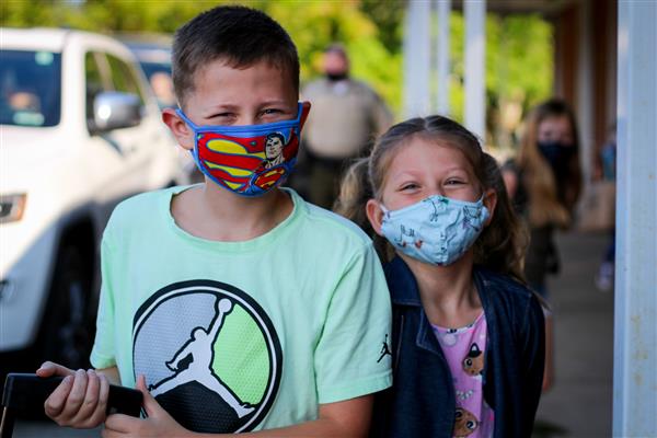 students smile on first day of school